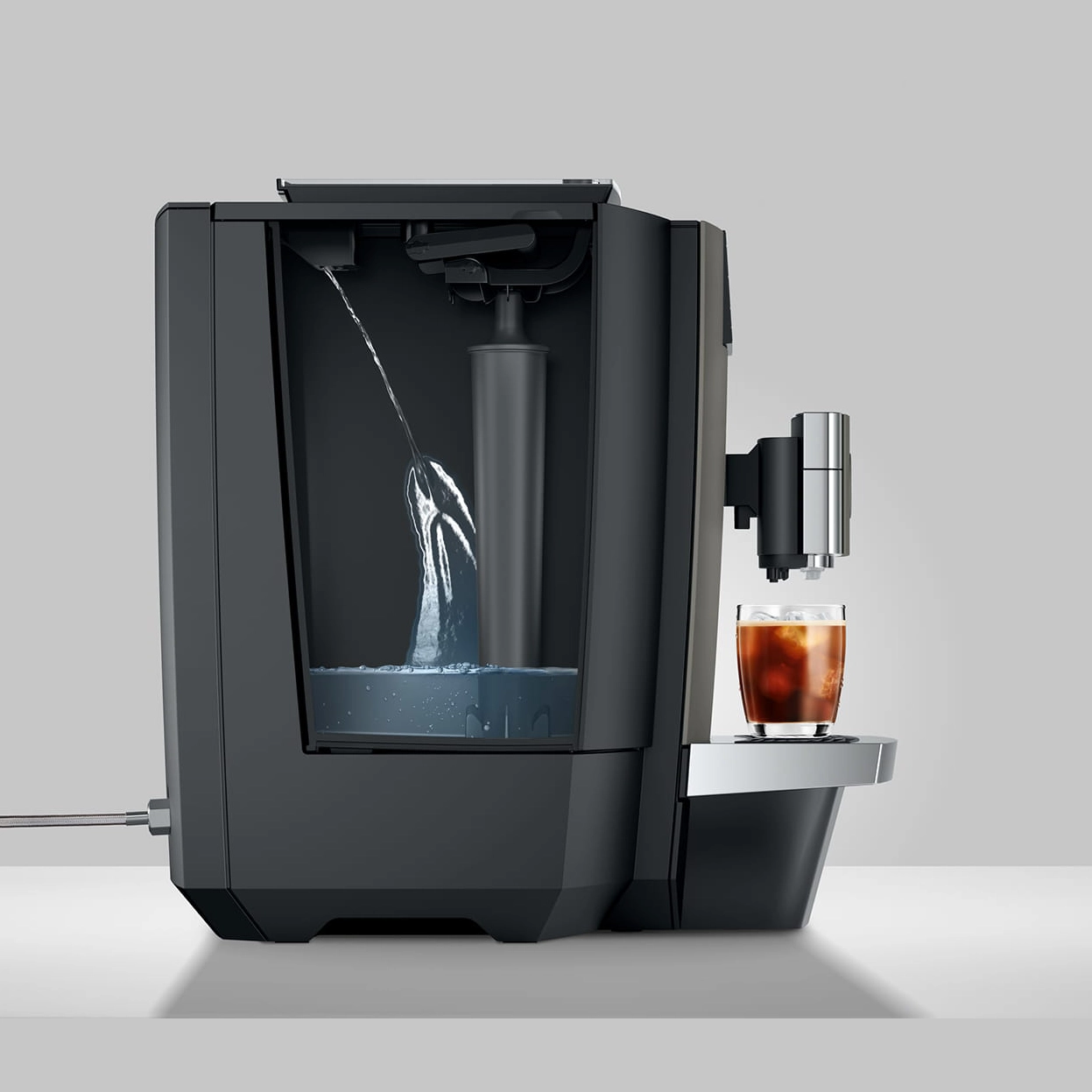 Jura 15624 Kaffeevollautomat X10c Seitenansicht mit Kaltgetraenk